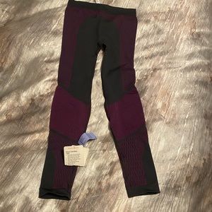 Purple and gray Lululemon full length tights 
About that base tight 
NWT